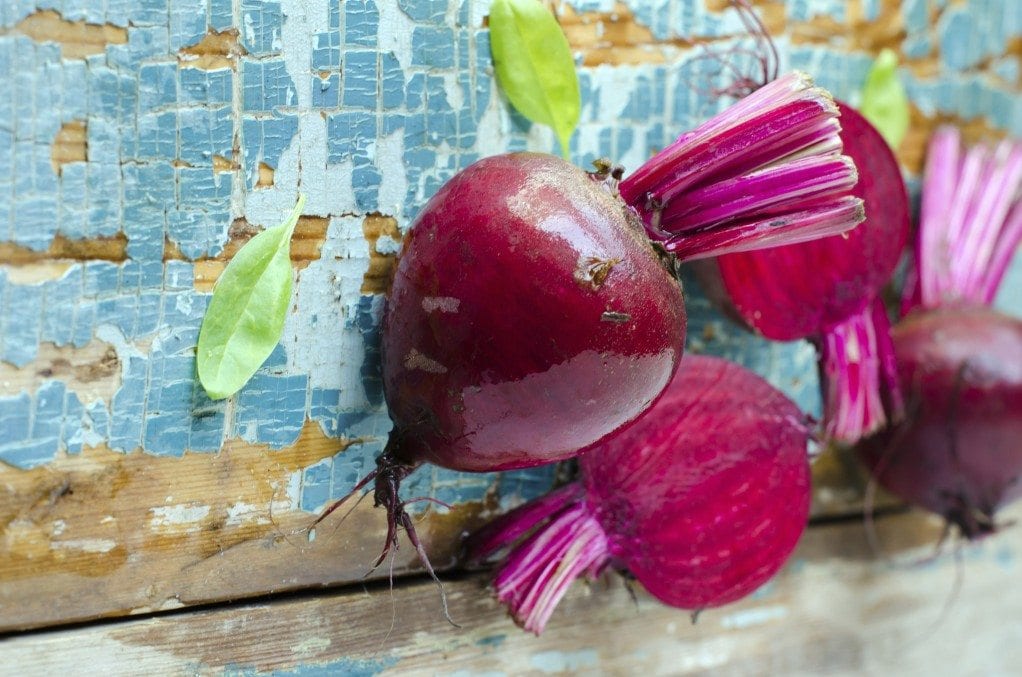 Fresh beet on a wooden background