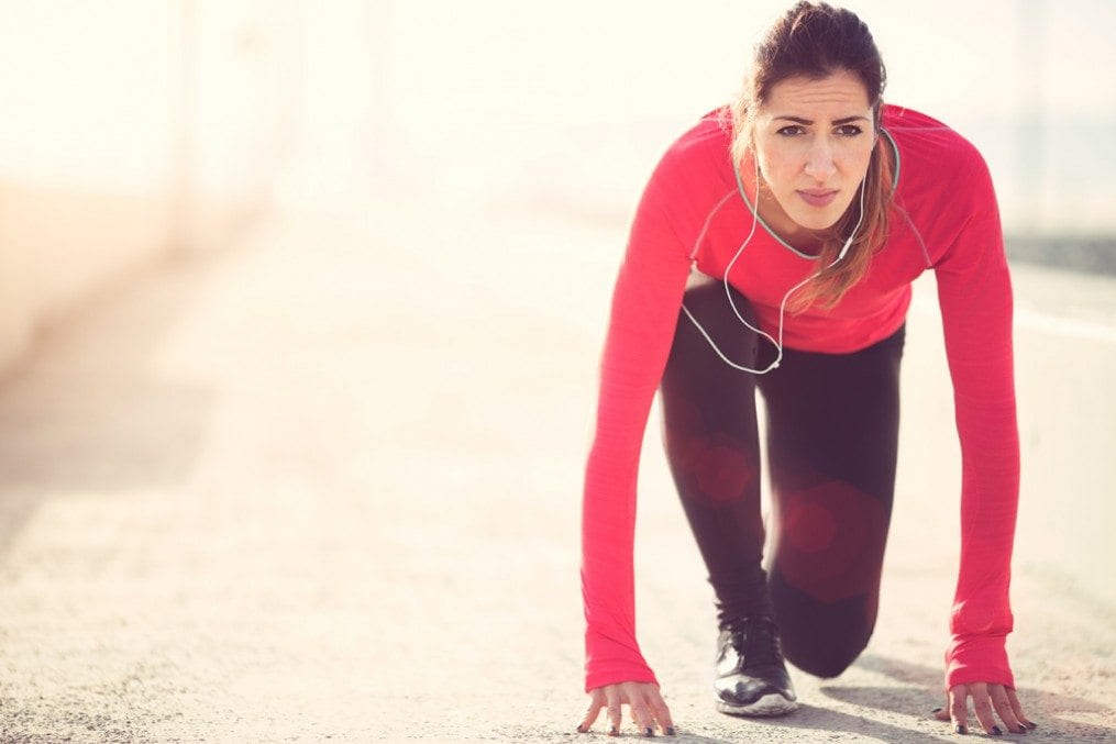 Competitive woman about to go for run