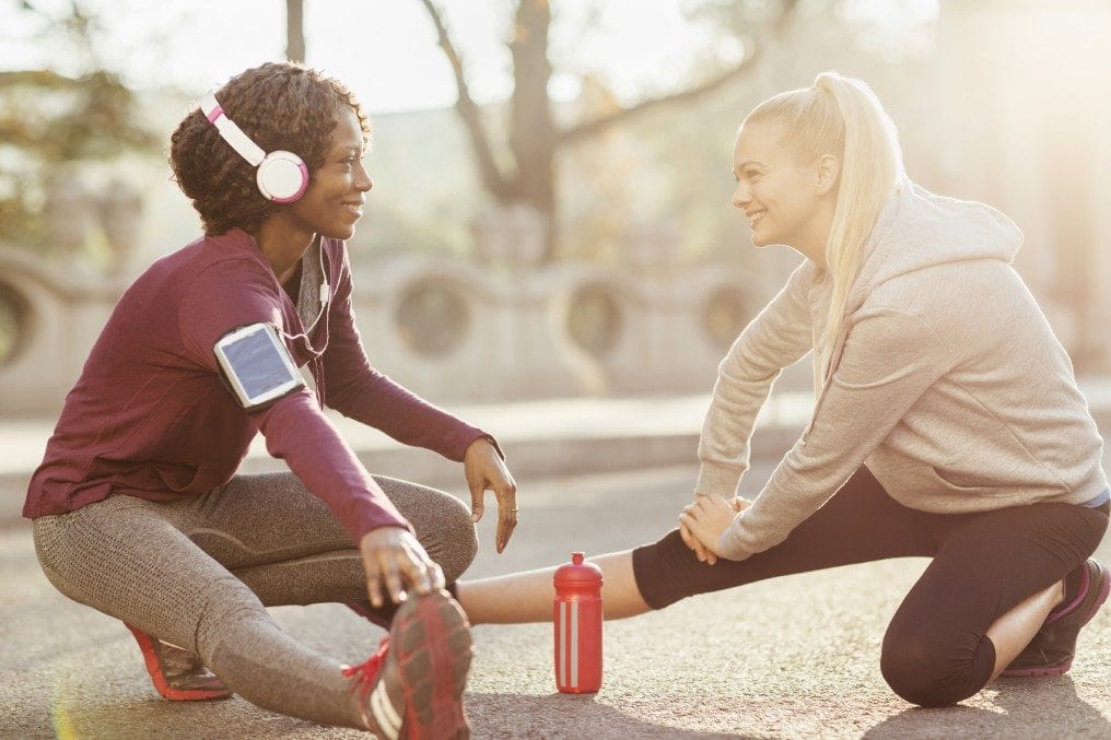 free_iStock_000055498268_Large.jpg friends stretching