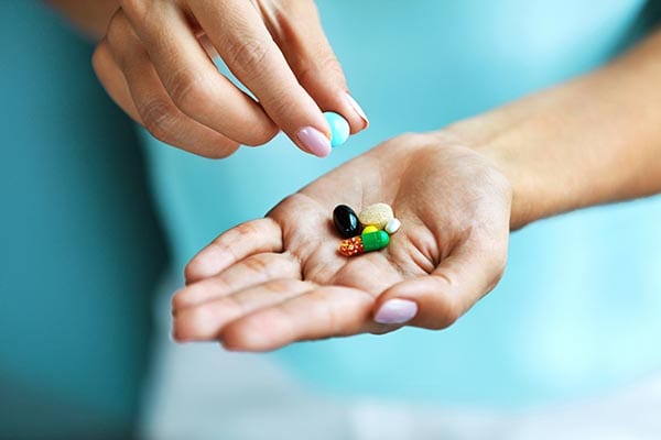 Supplements on a palm