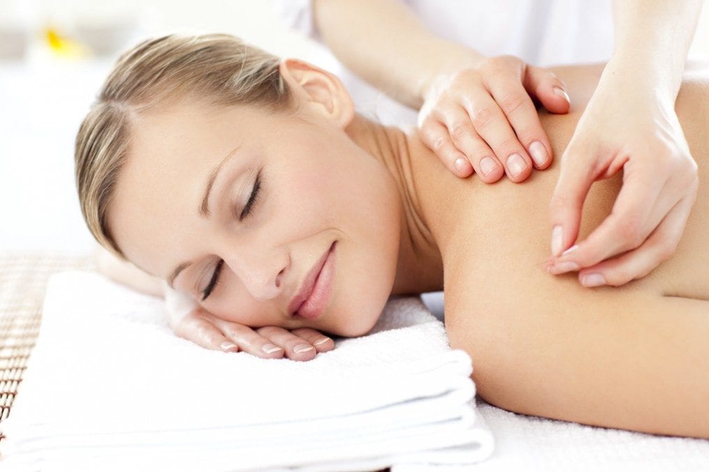 Woman receiving traditional Chinese treatment