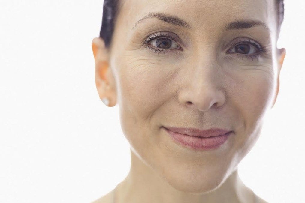 Close-up portrait of confident woman